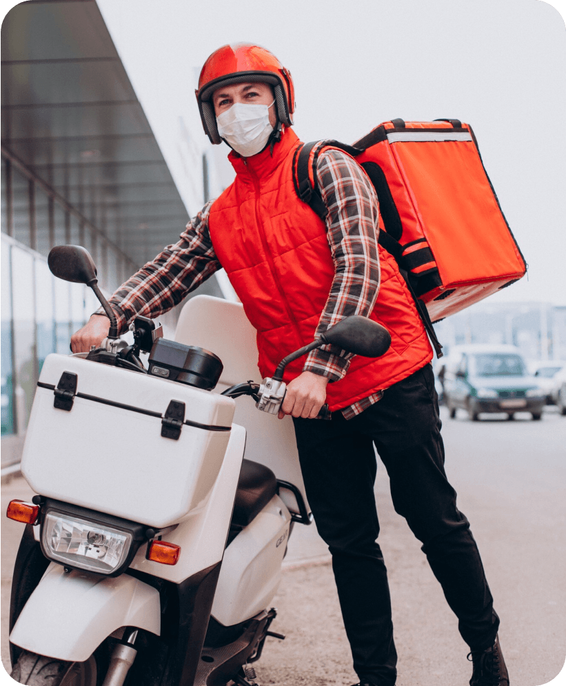 Delivery rider with orange bag and mask